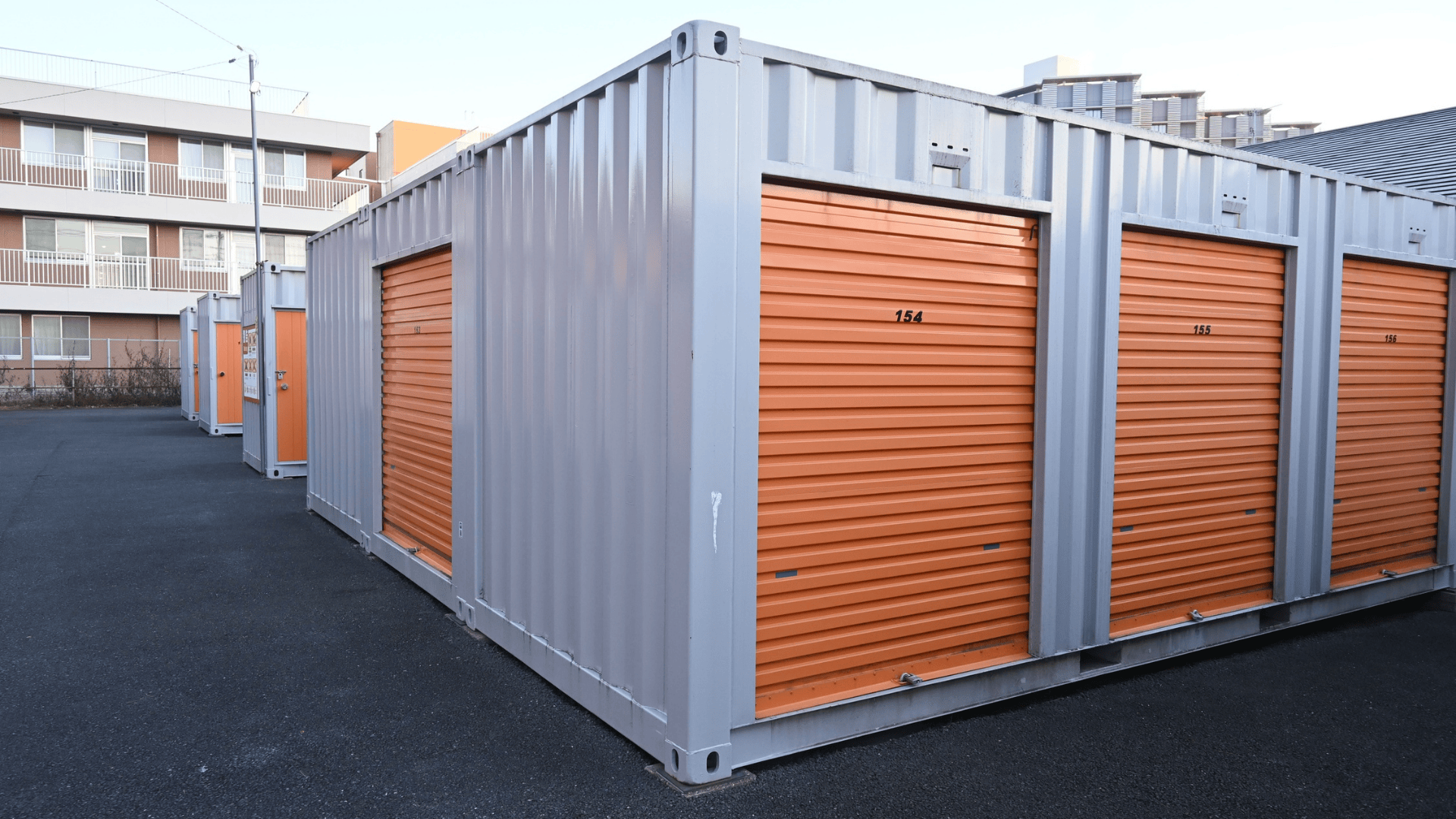 Self storage investment facility located beside a residential apartment building